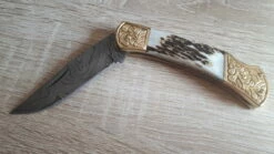 Damascus Stag Engraved Bolster -Kershaw Sale 7Fdamascus stag engraved bolster . 1 1